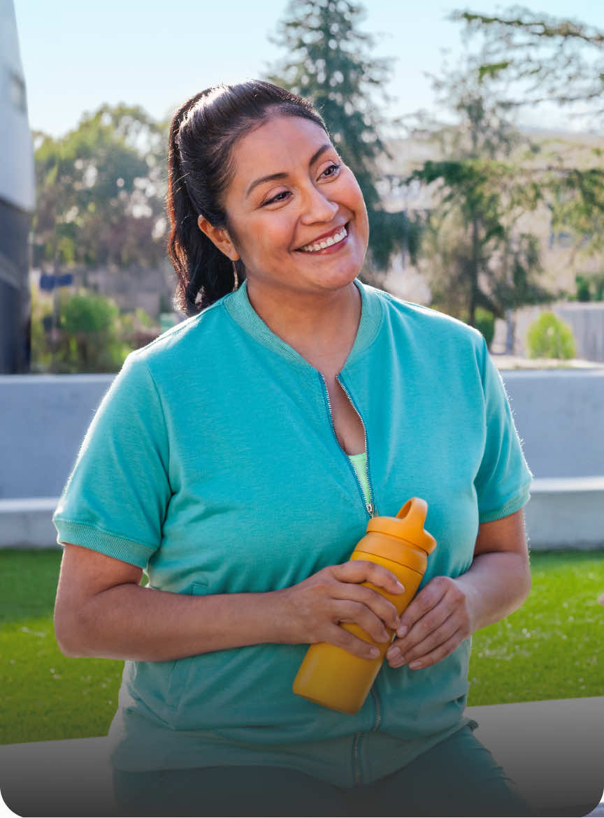 Jennifer, a 42 year old female DUPIXENT® (dupilumab) patient smiling 